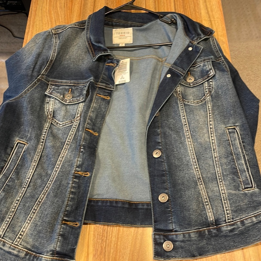- New with tags! Torrid denim jacket size 2!
